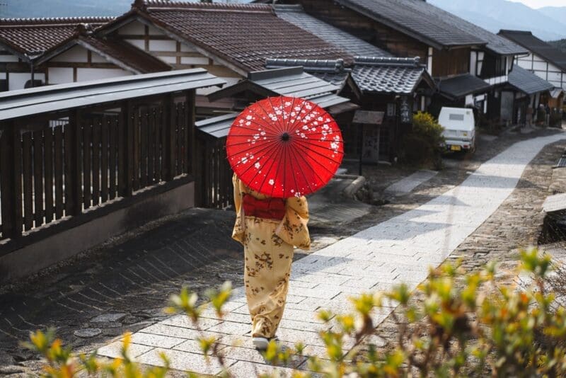 woman wearing a kimono with parasol 