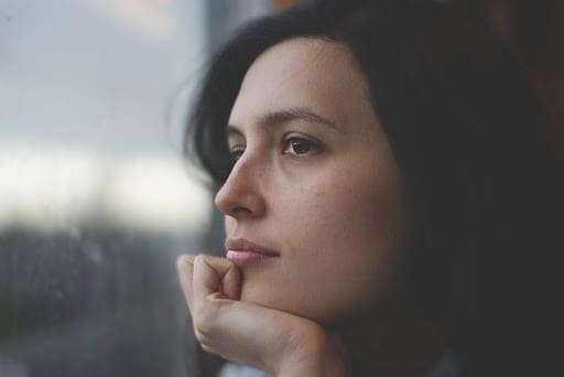 woman staring off into space