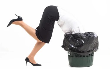 woman in a trash can