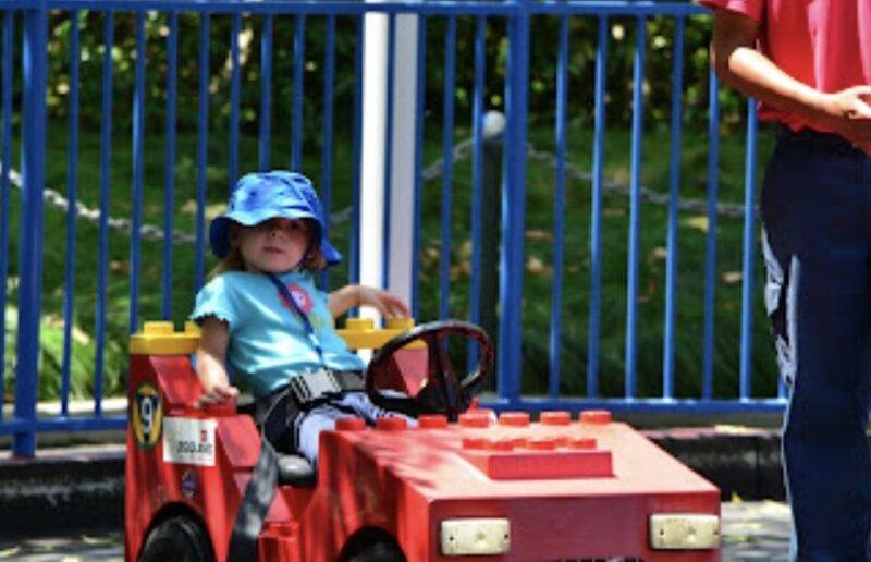 Little girl driving at LegoLand 