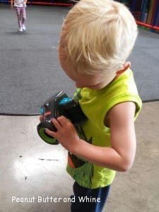 Little boy using PlaySkool Kids Camera