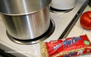 woman making popcorn balls