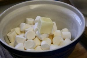 woman making popcorn balls