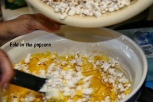 woman making popcorn balls