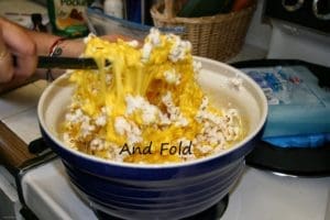 woman making popcorn balls