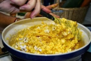 woman making popcorn balls