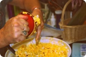 woman making popcorn balls