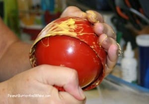 woman making popcorn balls