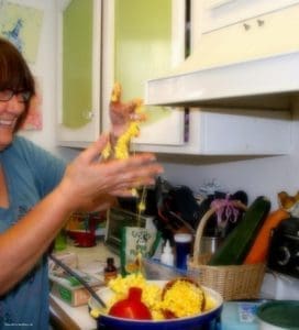 Woman making popcorn balls