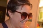 Smiling woman in sunglasses