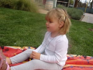 Little girl on the Wamber Picnic Blanket