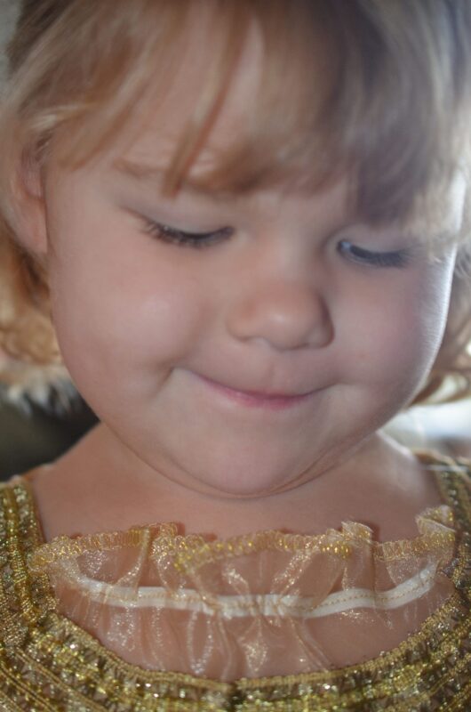 Little girl in Disney Princess costume