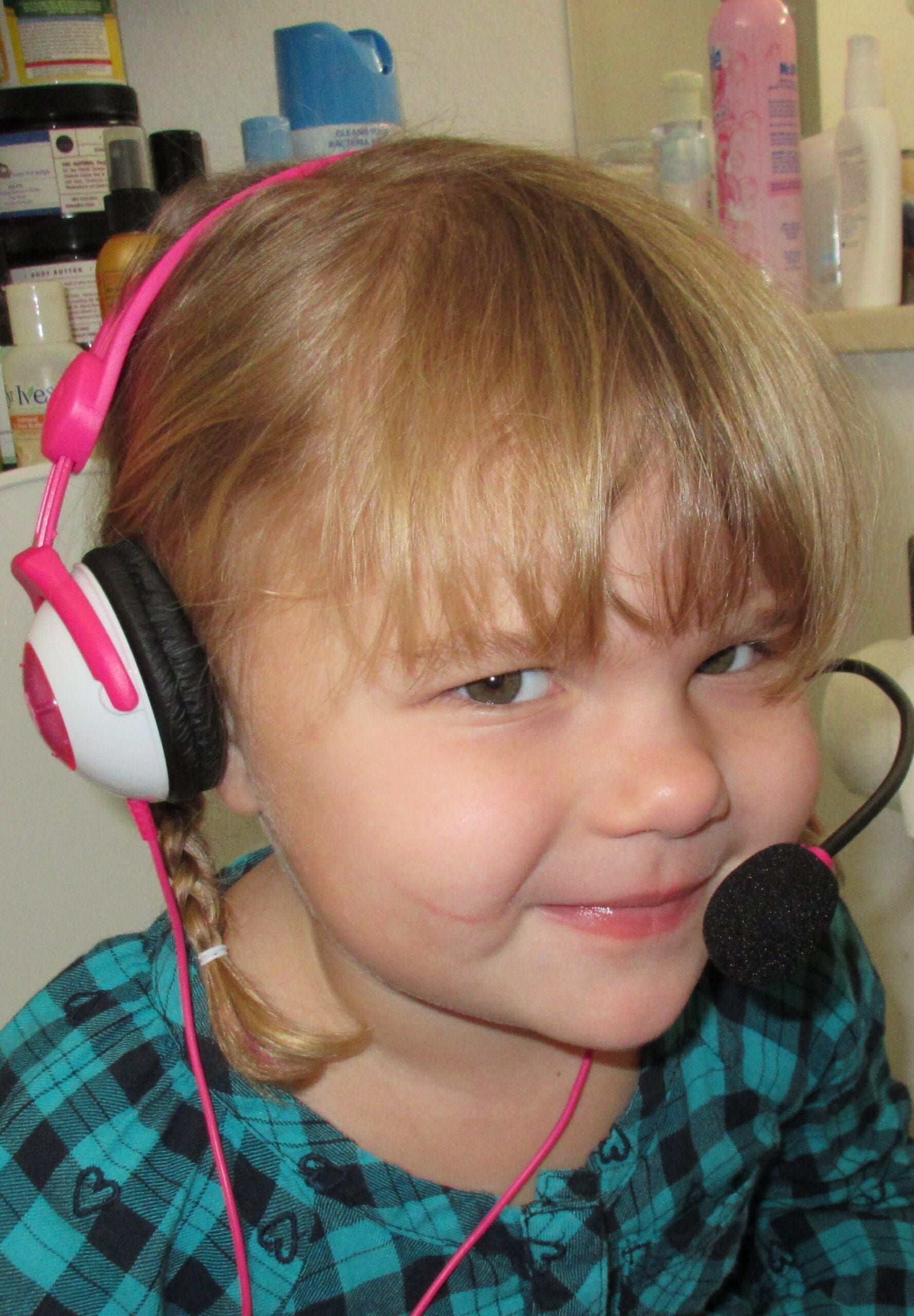 Little girl using her Kidz Gear Deluxe Headset
