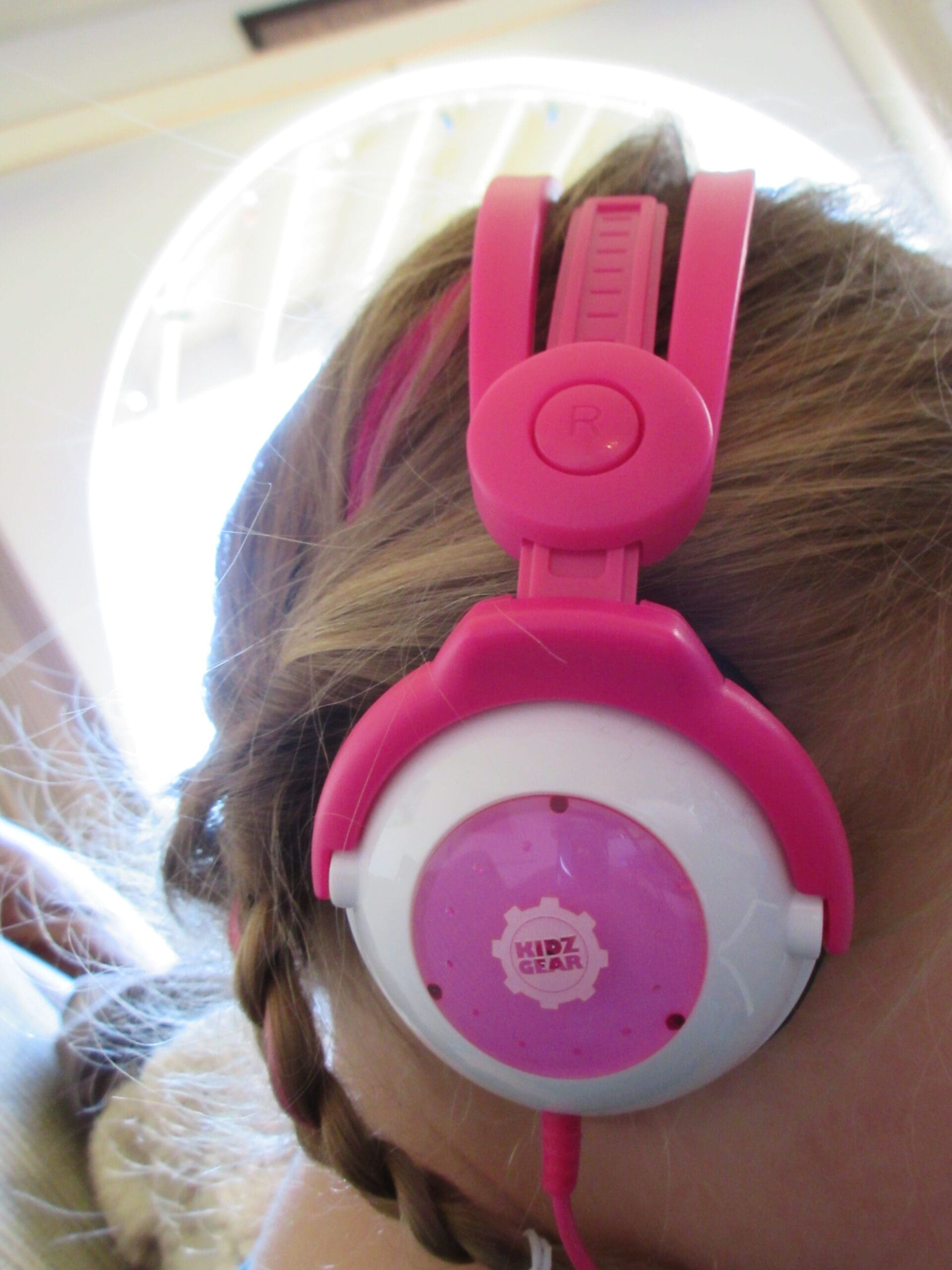 Little girl using her Kidz Gear Deluxe Headset