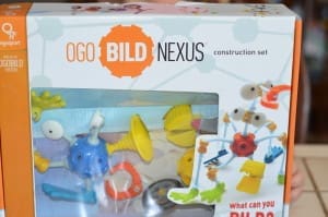 Little girl building a OgoBild toy