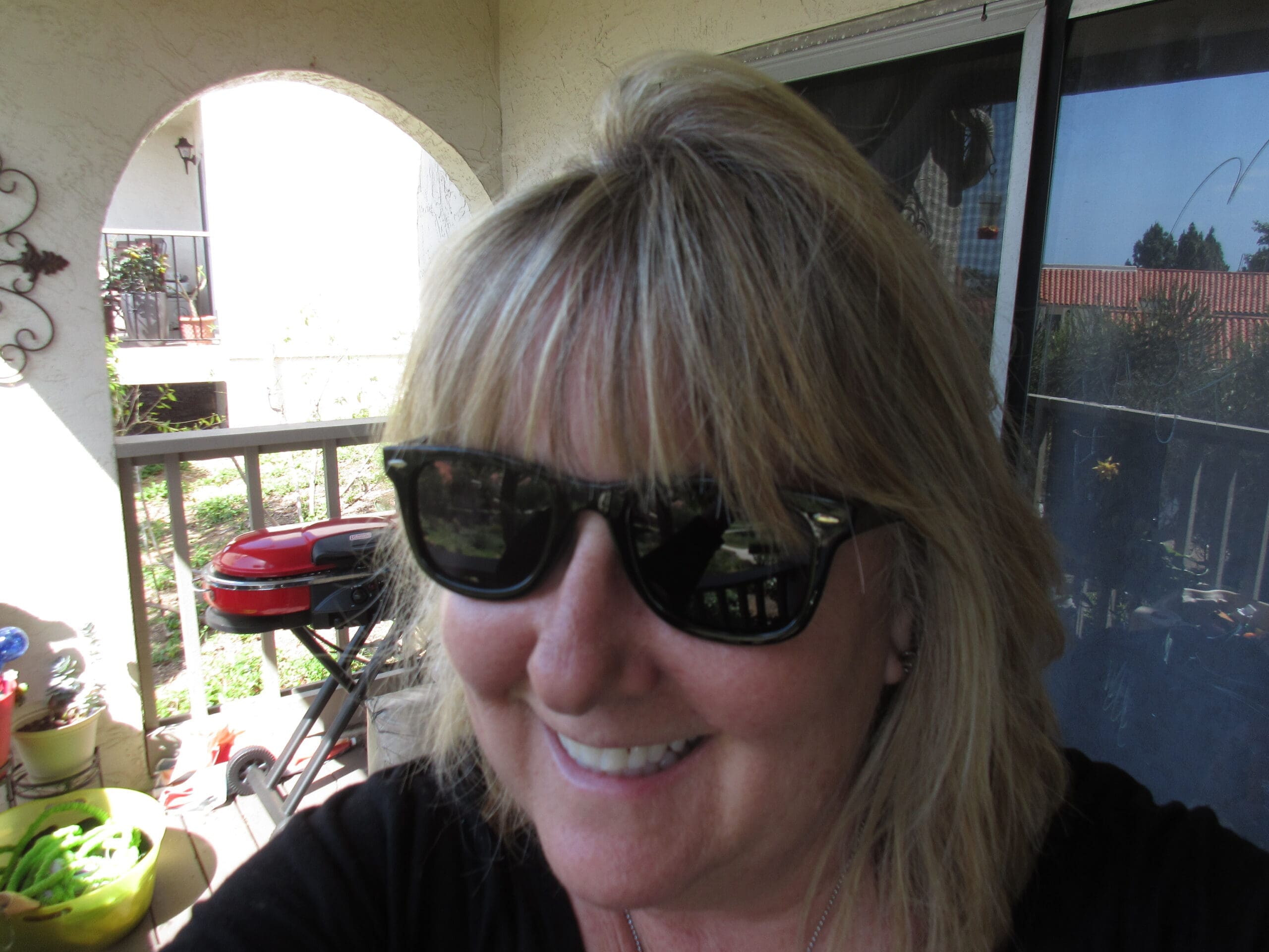 Lady wearing Wayfarer Sunglasses