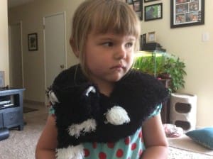 Little girl with Scruffy Cat heating pad for kids