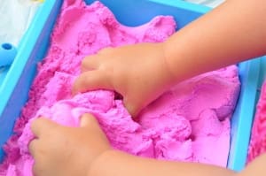 Little girl playing with Sands Alive