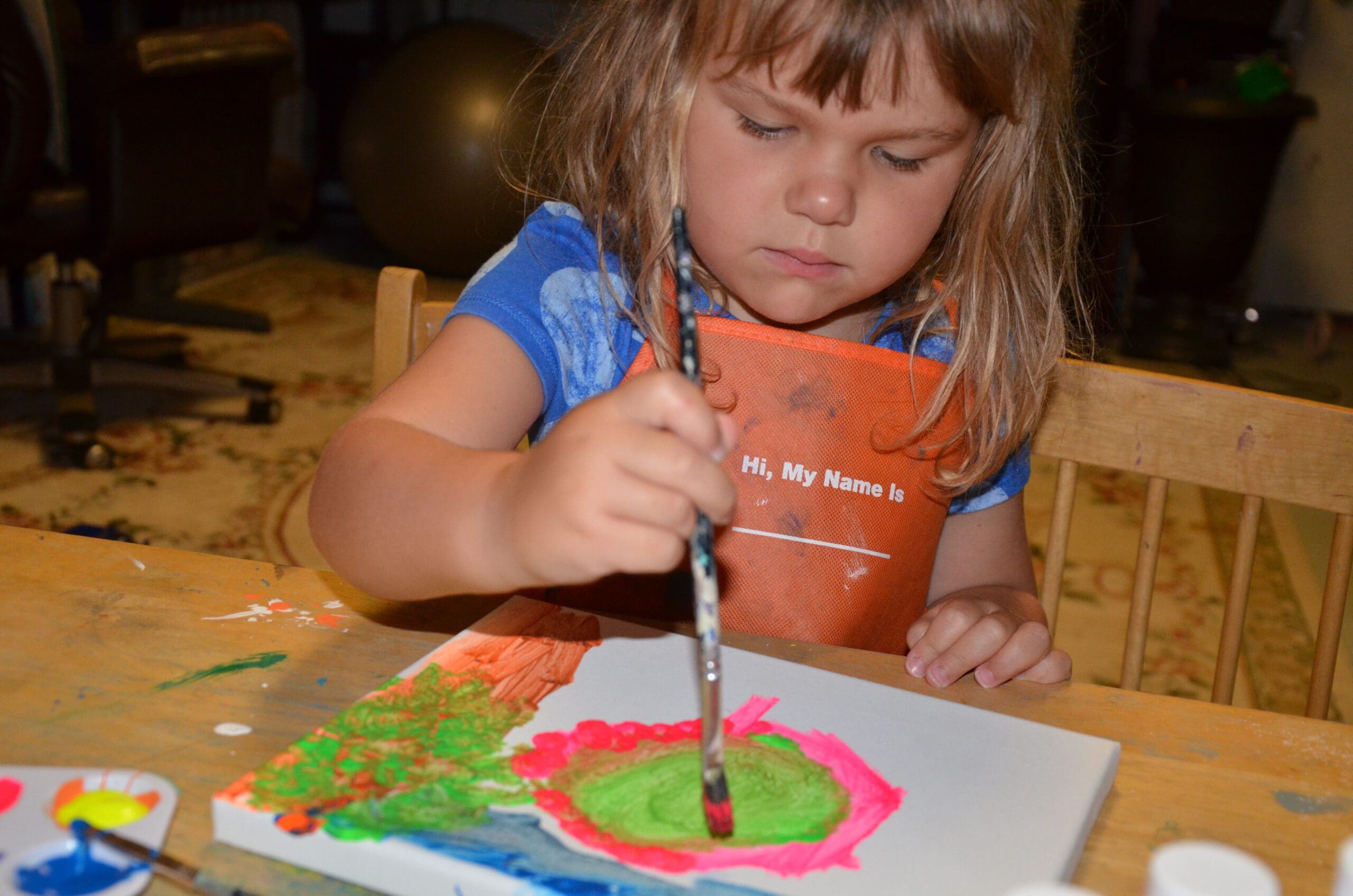 Little girl painting