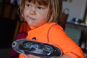 little girl in swim goggles