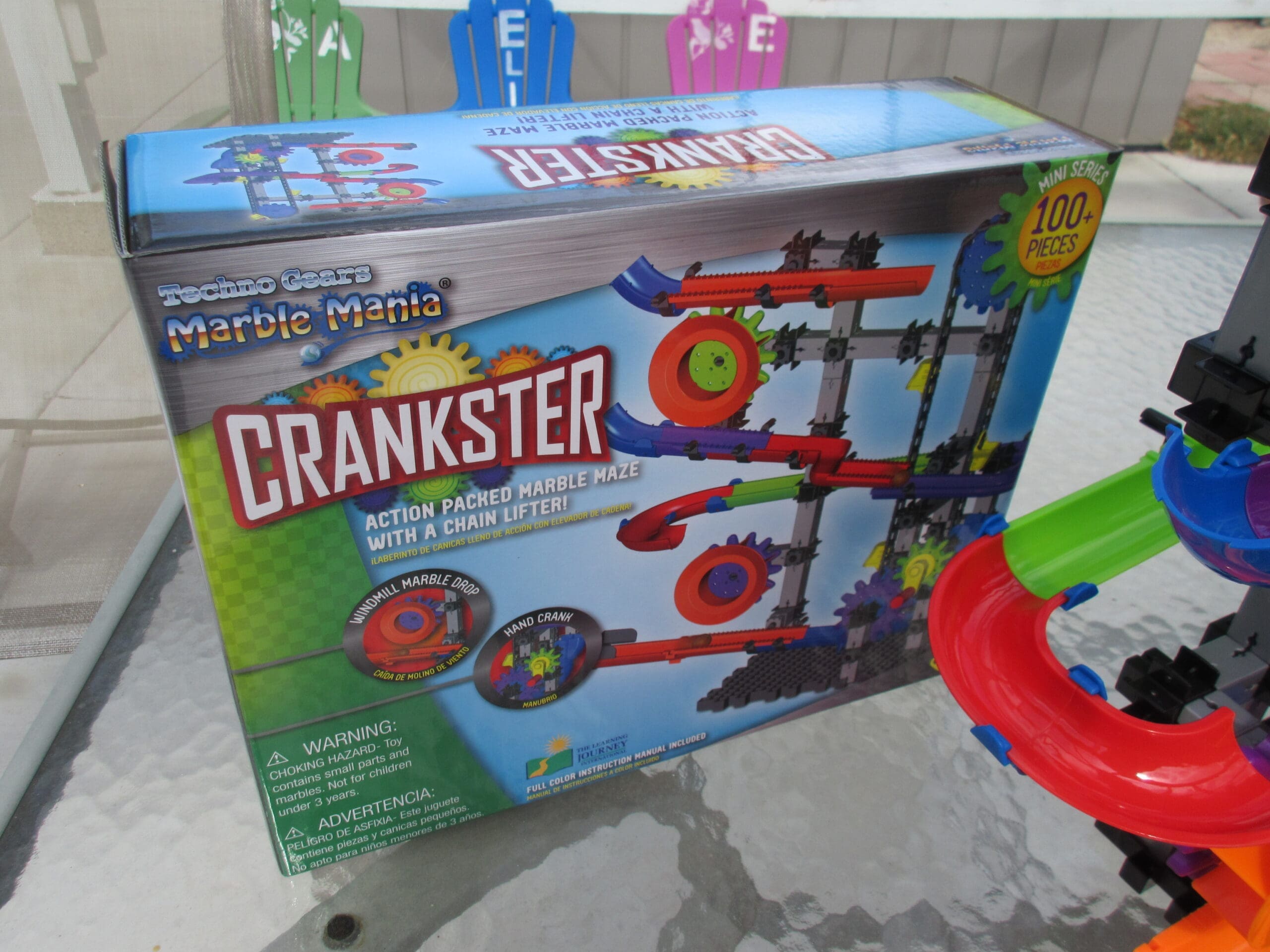 Marble Mania Crankster little girl playing with marble mania crankster toy