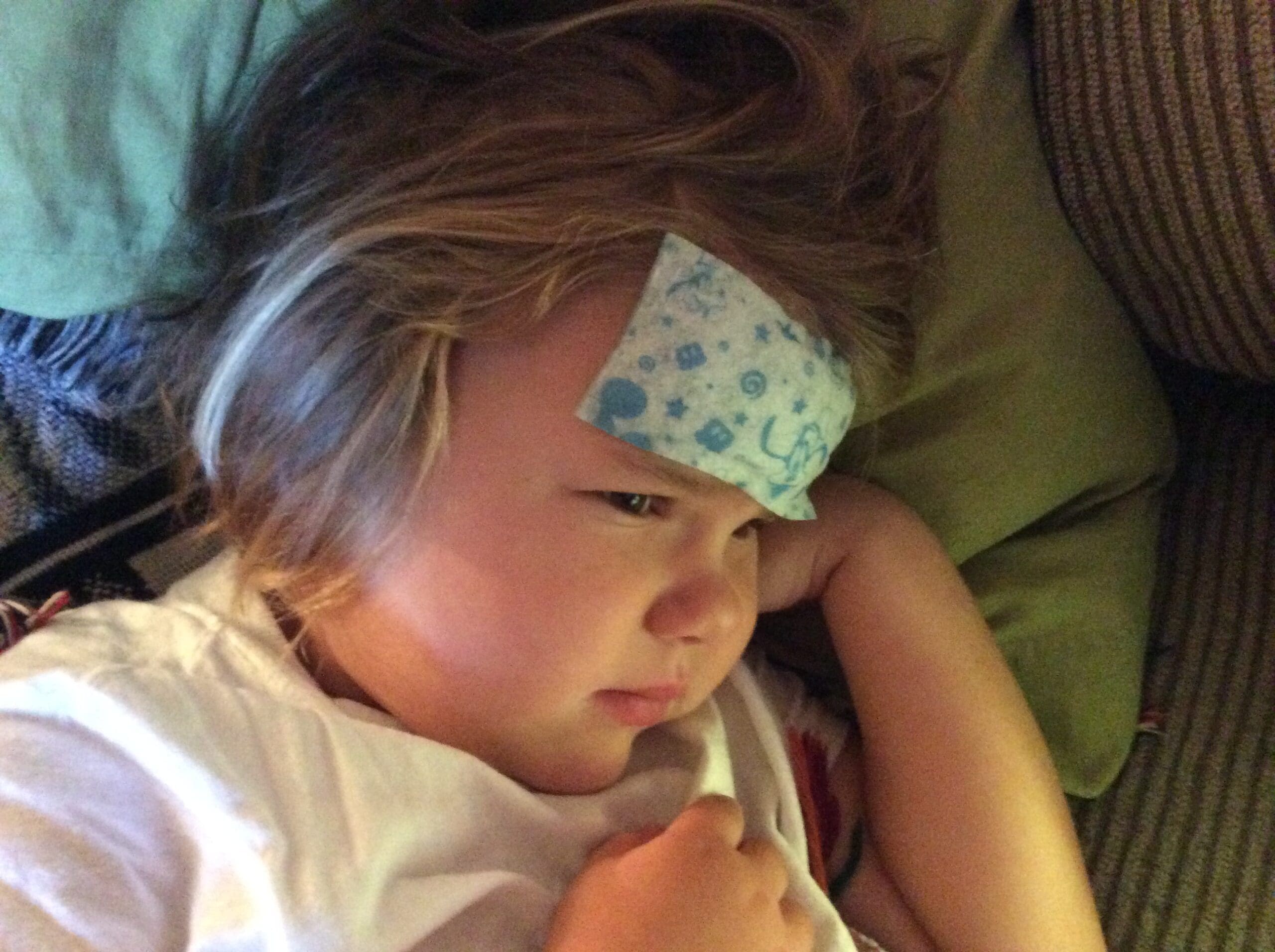 little girl with a BeKoool cooling pad on