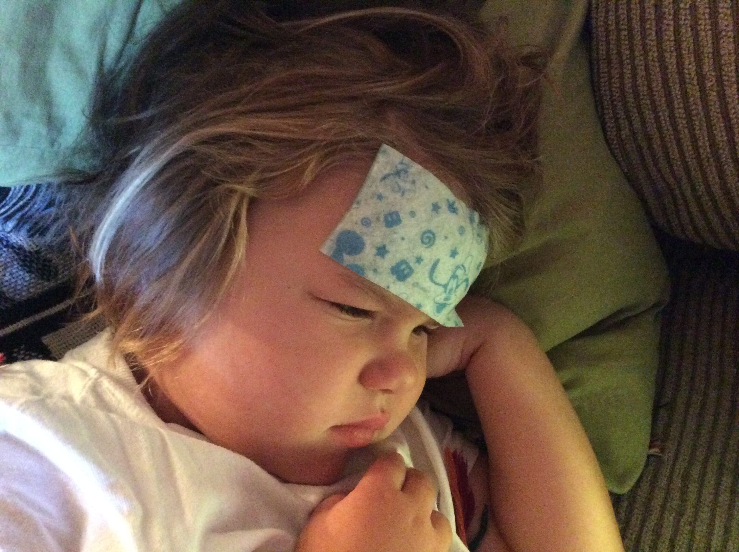 Little girl with a BeKoool cooling pad on