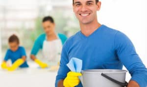 Home cleaning man with a bucket
