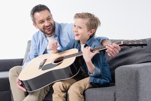 Dad, son and guitar
