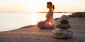 Ease stress meditating woman