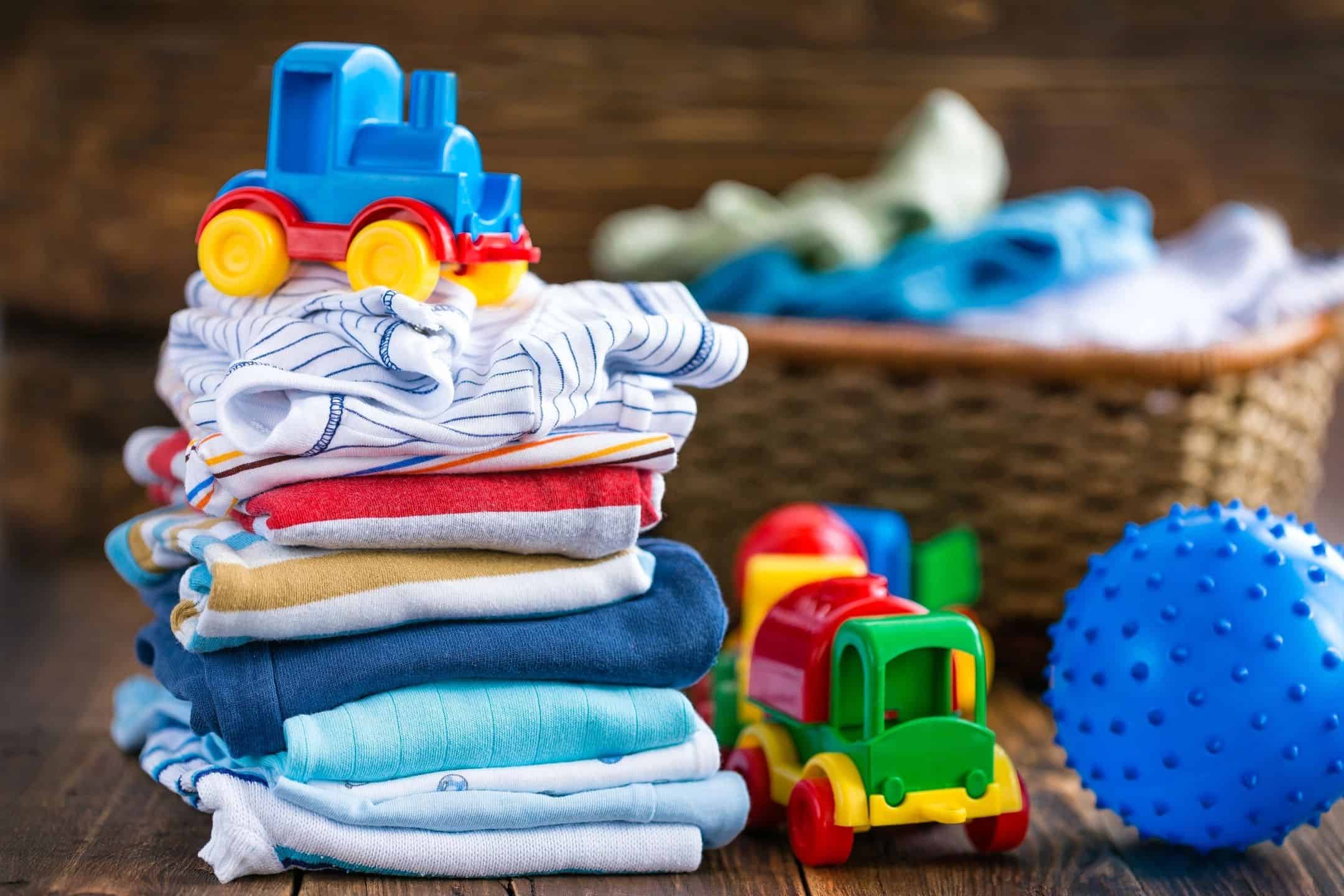folded kids clothes and toys