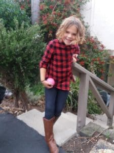 Little girl in flannel shirt