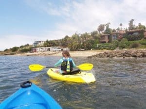 Little girl on paddle board