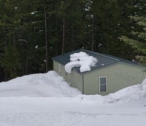 Love Lettering C in snow on roof