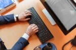 IT Support Man typing