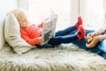 toddler reading a book