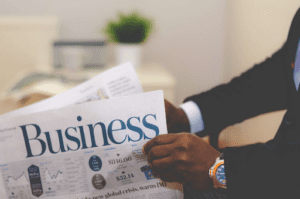 Successful Business Owner Businessman with newspaper