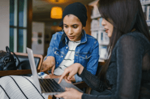 Modern Marketing Women using a Computer