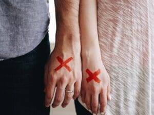 Surviving Divorce man and woman hands