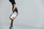 Business More Successful person handing someone a phone Make Your Business More Successful