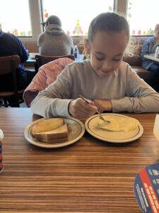 Little girl eating lunch