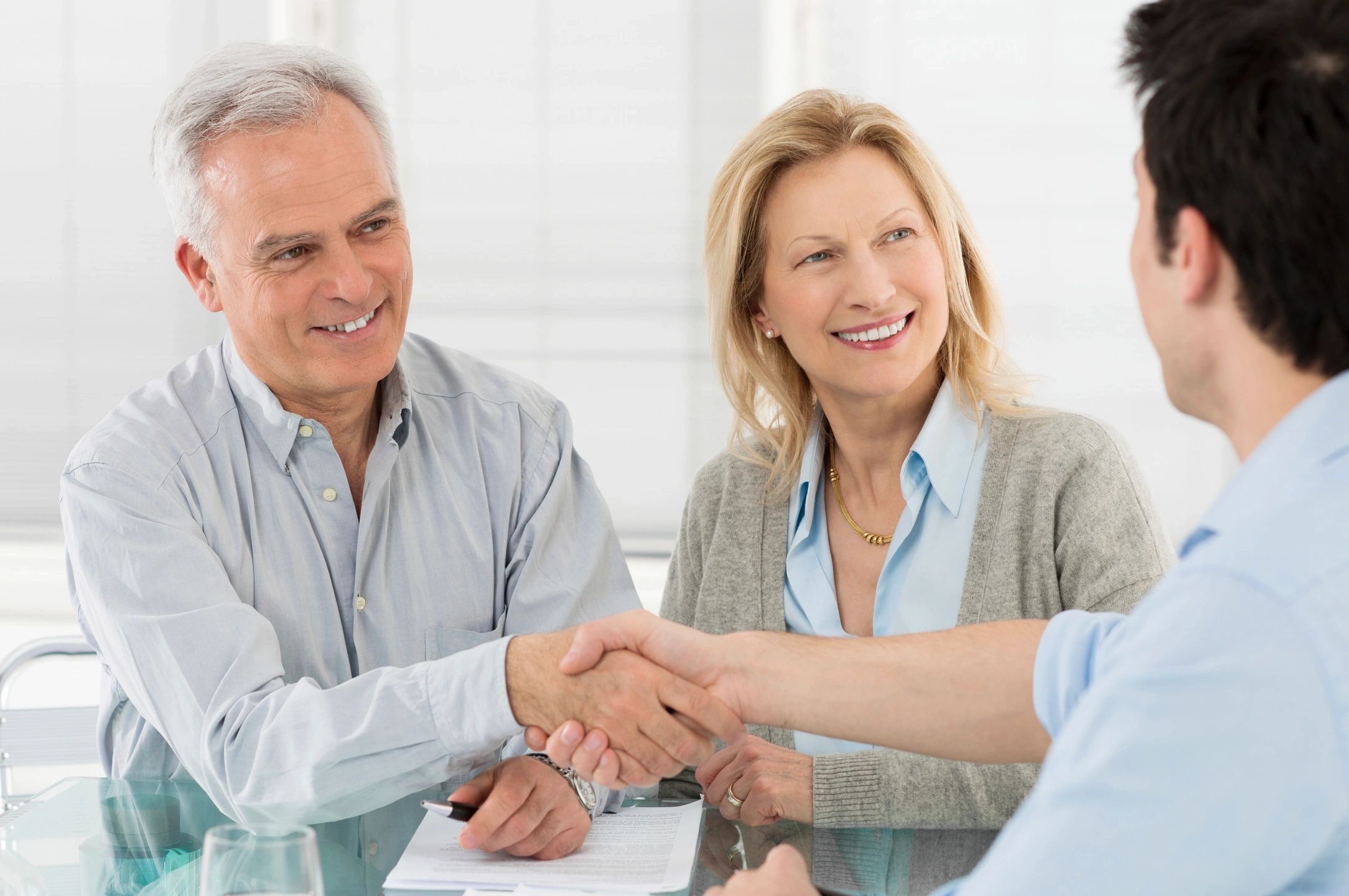 Investment Insight Couple shaking hands
