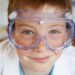 Science little boy with protective eyewear
