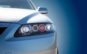 Car Insurance silver car headlights