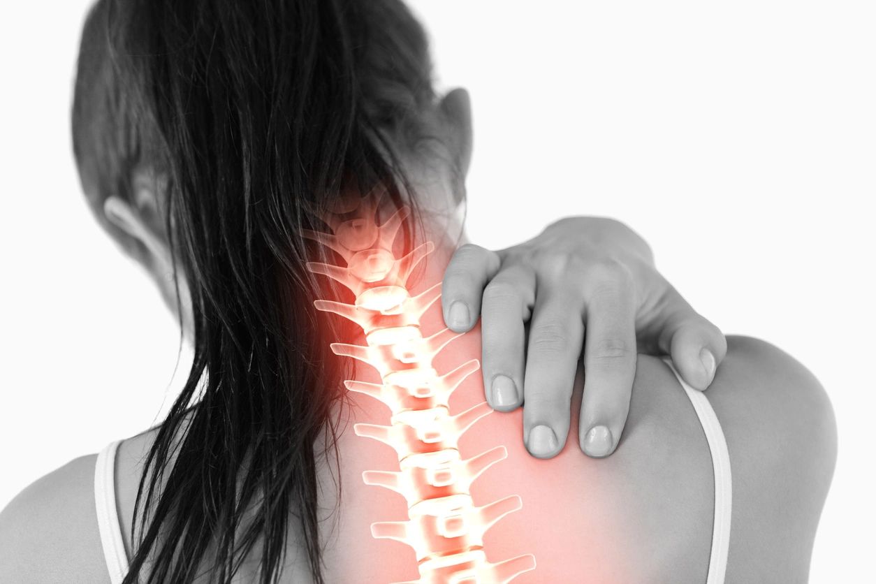 Woman with a spine showing. pain management
