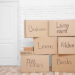 neatly stacked and labeled moving boxes.