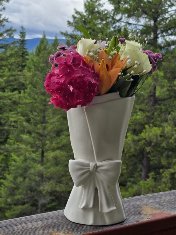 Flower vase, ceramic with a bow. 