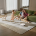 Parents sitting on the floor with a child playing. Smart Home Maintenance