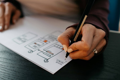 Small Business Dreams Woman creating a business graph